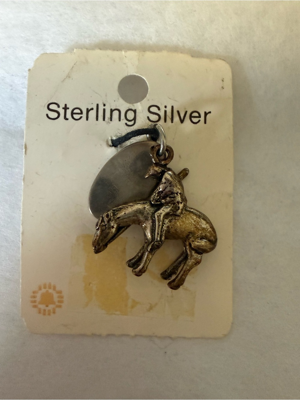 Silver Jeans silver-tone cowboy on horse charm